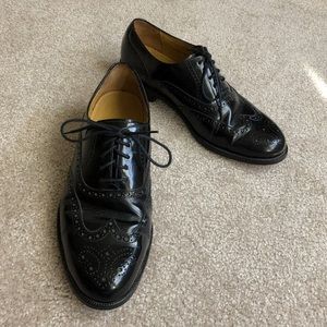 Cole Haan black wingtips